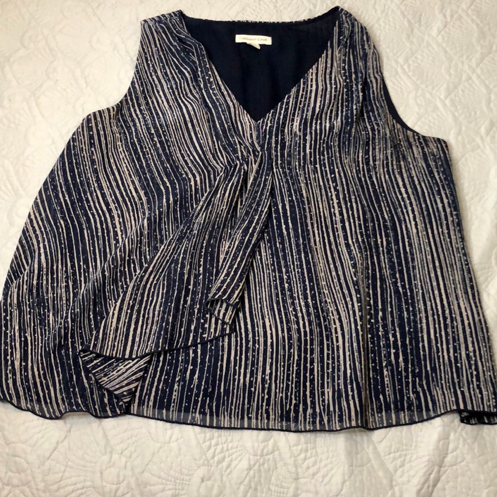 Sleeveless Top with Flyaway Front